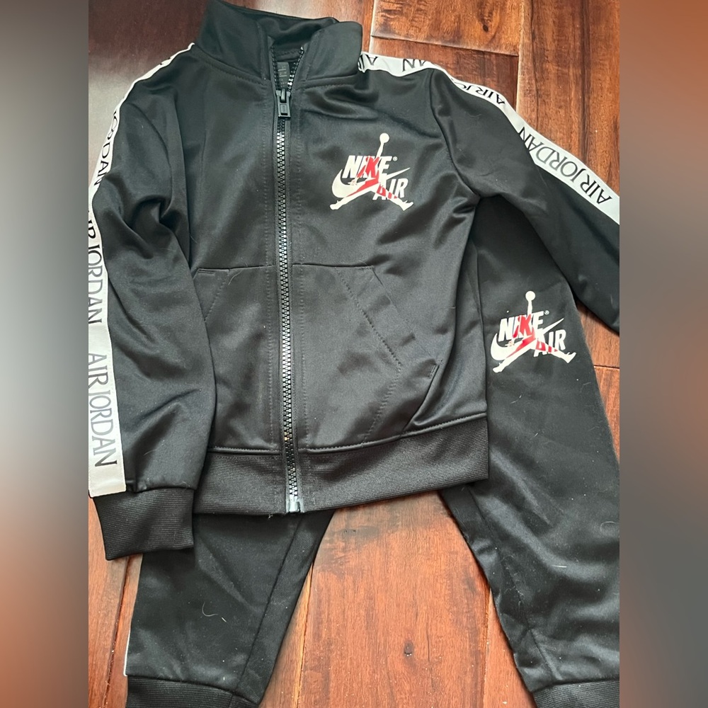 Jordan Black Jacket with Red Logo